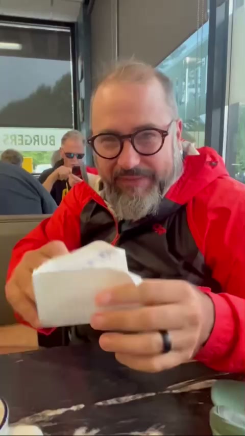 Boom Baum reading the letter at breakfast